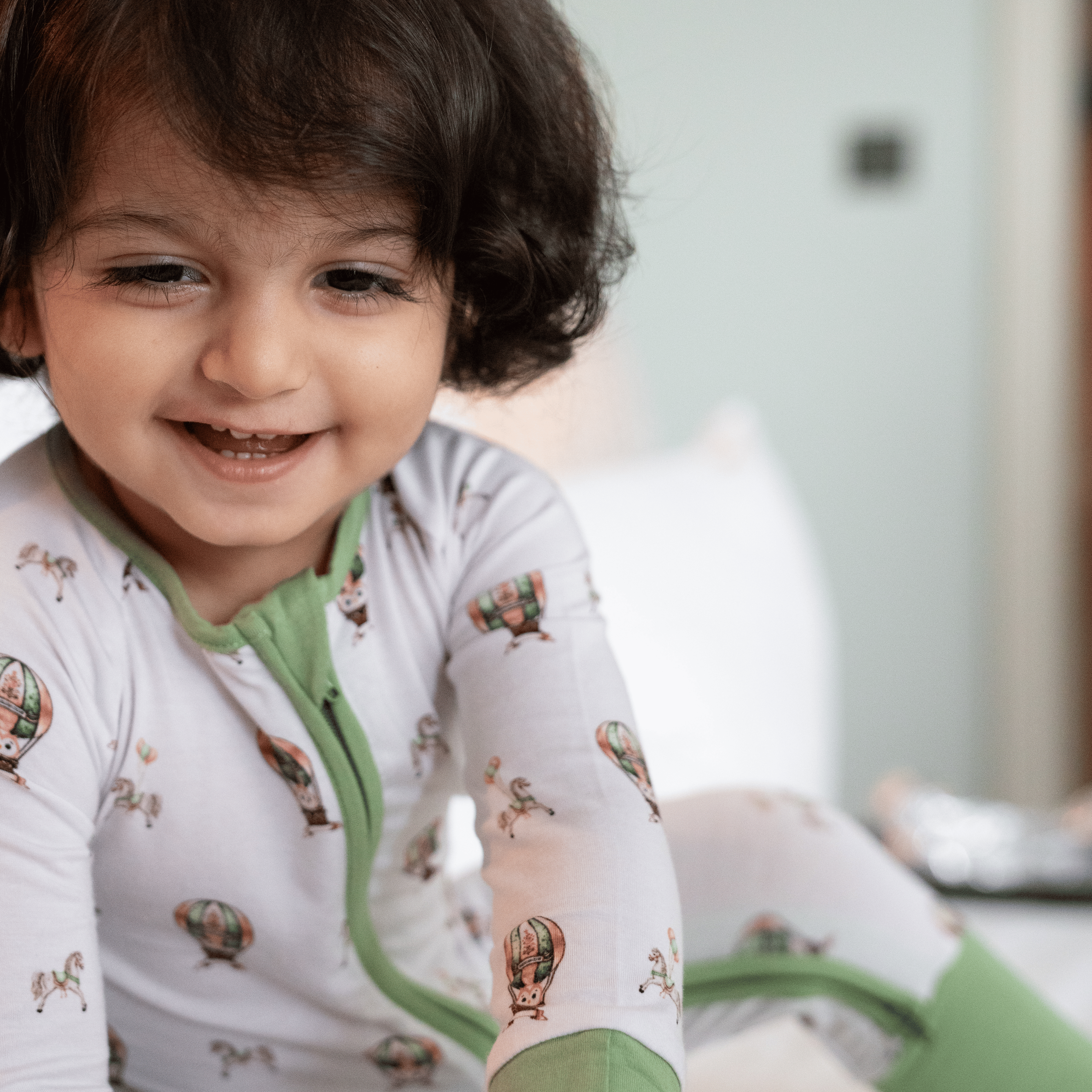Owl Voyage onesie, swaddle and pillow combo