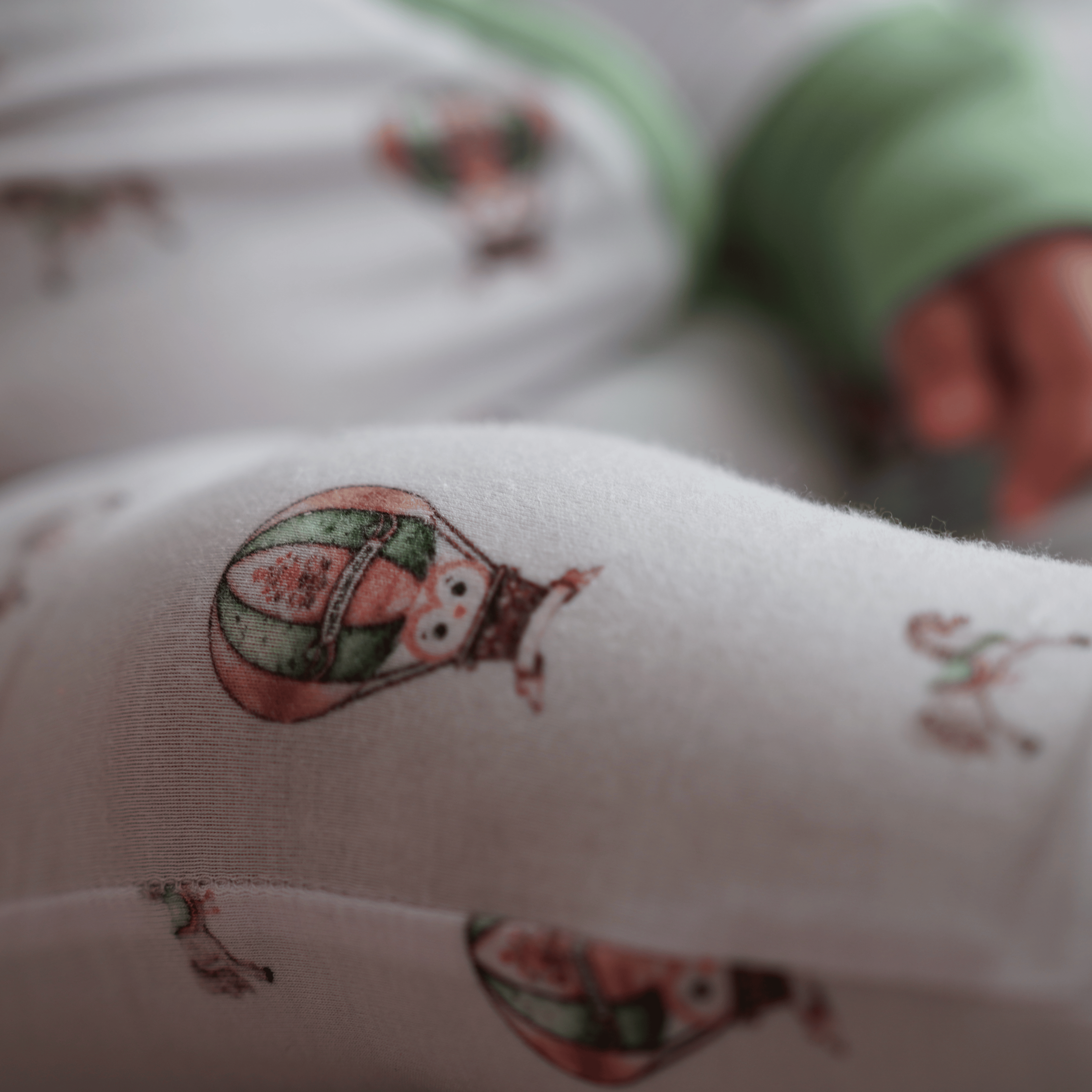 Owl Voyage onesie, swaddle and pillow combo