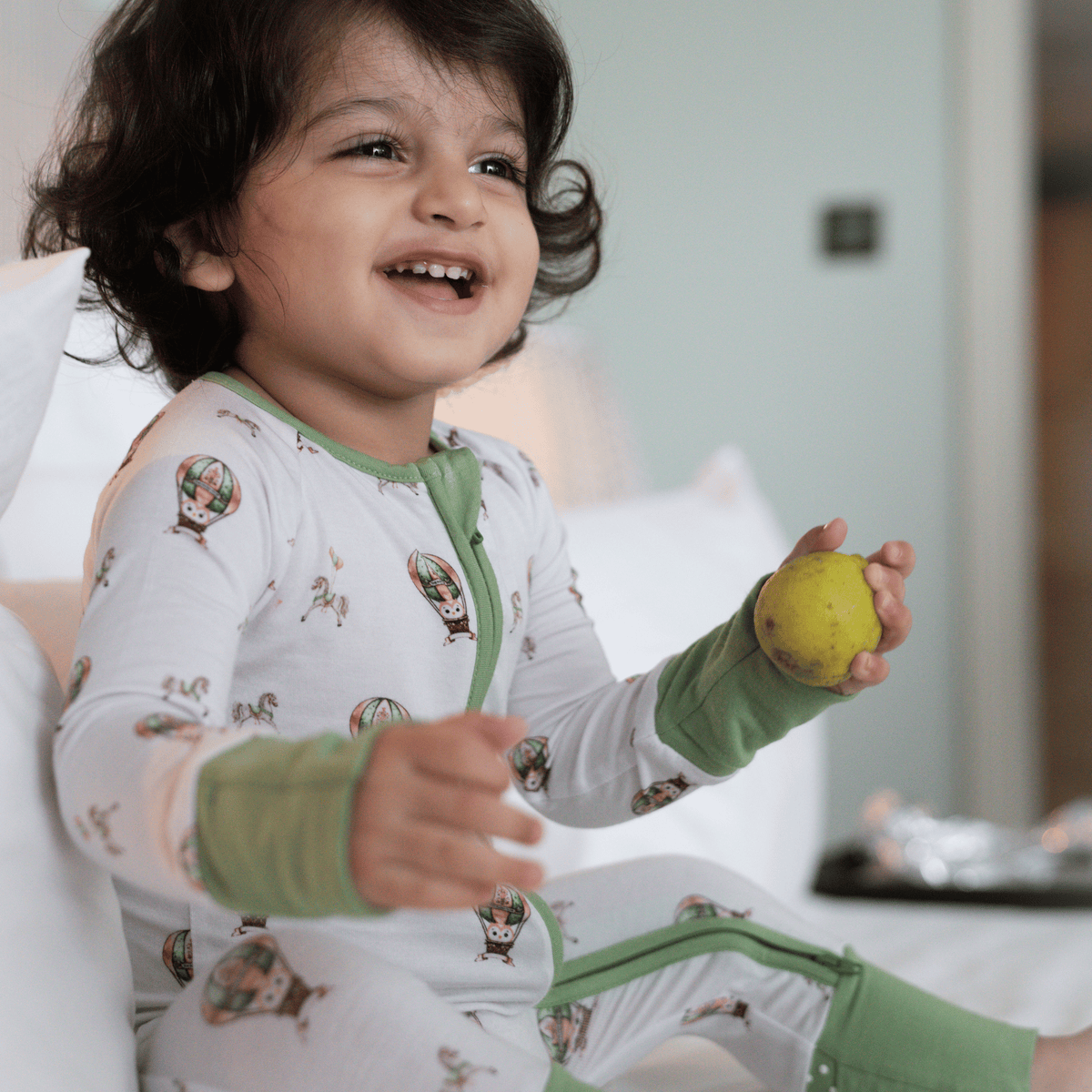 Owl Voyage onesie, swaddle and pillow combo
