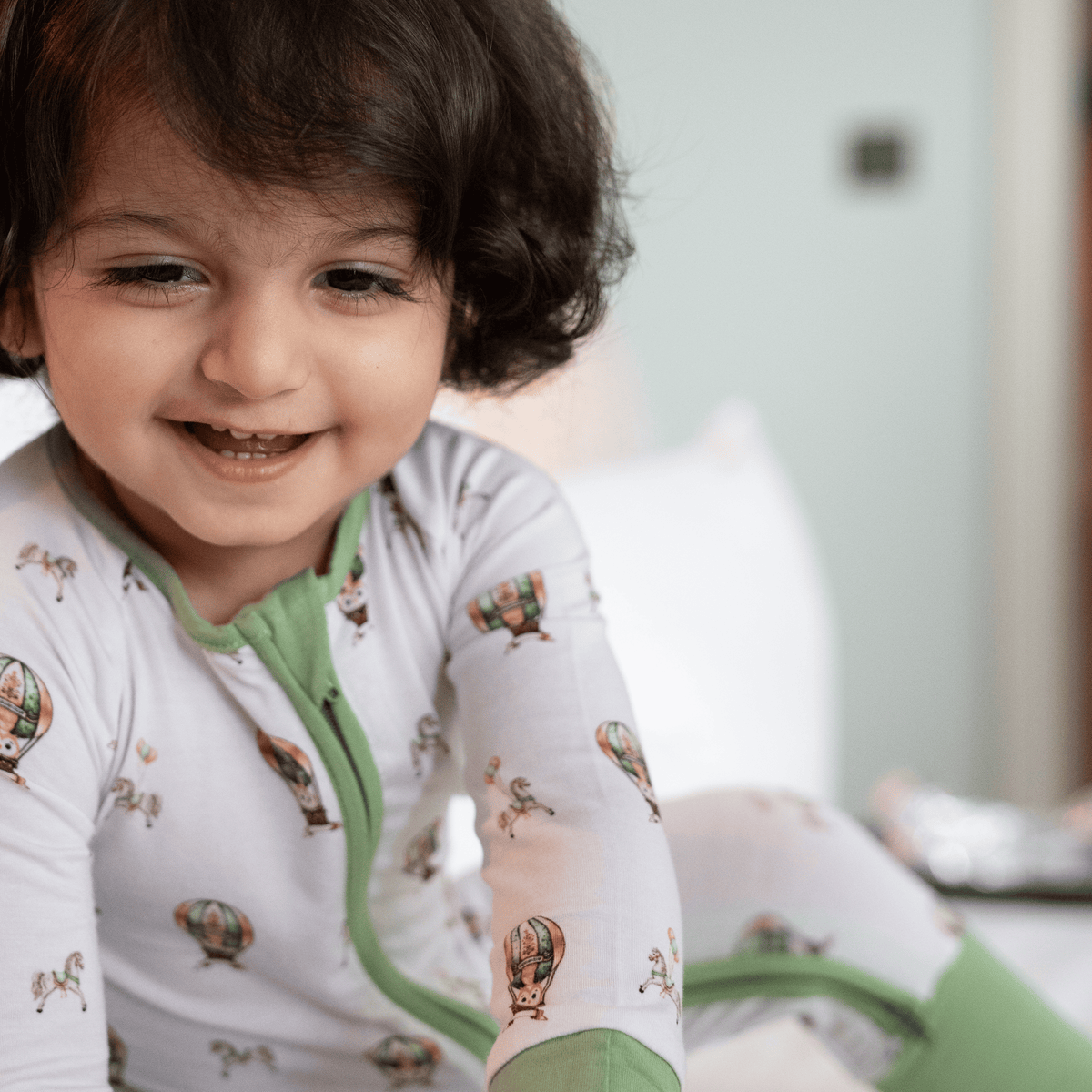 Owl Voyage onesie, swaddle and pillow combo